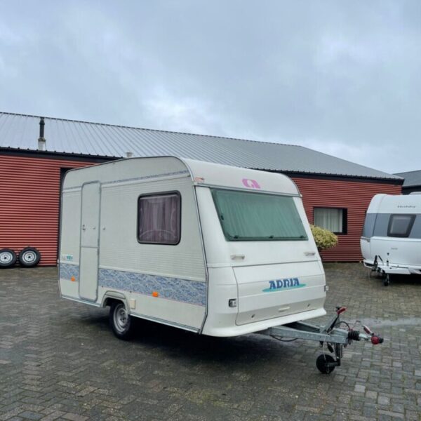 Adria Unica 320DD, bj. 1998 met VOORTENT LUIFEL lichtgewicht